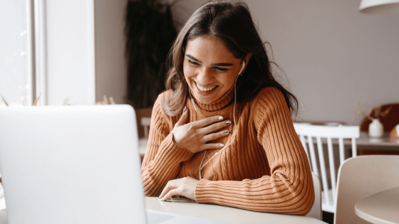 woman calling friends through video to stay socially connected while working from home